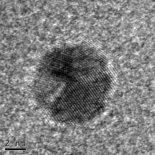 a) TEM image of spherical particles b) HRTEM image of a spherical particle, showing crystal defects. 12.
