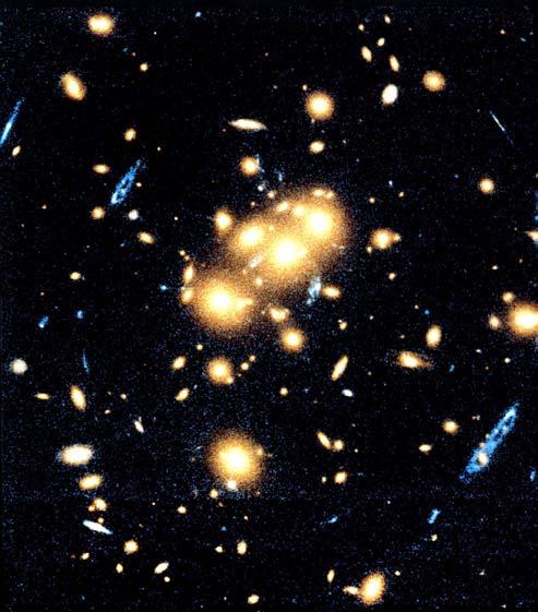 If another galaxy lies directly behind, as seen from earth, a distorted image of this further galaxy