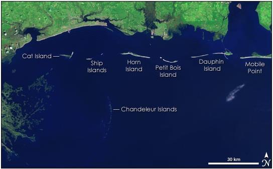 Image modified from NPS The satellite image above shows several barrier islands offshore from the Gulf Coast of the southern United States. Over time, weathering and erosion could A.
