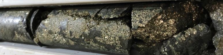 85m of 30% semi-massive pyrite with clots up to 8mm and trace chalcopyrite veinlets 152.