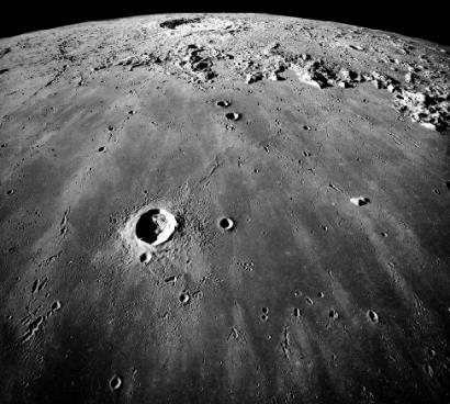 FIGURE 9.9 Lunar Maria. About 17% of the Moon s surface consists of the maria flat plains of basaltic lava.