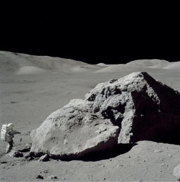 FIGURE 9.3 Scientist on the Moon. Geologist (and later US senator) Harrison Jack Schmitt in front of a large boulder in the Littrow Valley at the edge of the lunar highlands.