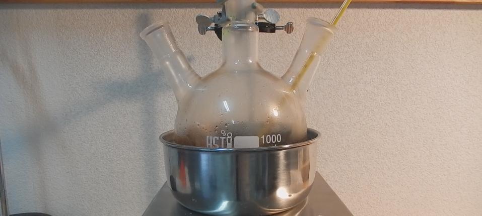 Heating the reaction mixture on a hot water bath Once no more nitrogen is evolved, set up for steam distillation using the following (or similar) apparatus: Apparatus for steam distillation The