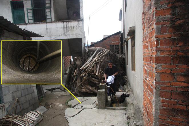 m, width of 23.0 26.0 m, and a depth of 1.0 m at the center of the subsidence. Four fractures formed around this subsidence area, which caused building no. 4 to be tilted to the north.
