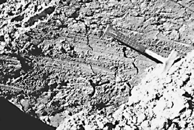 OTHER GEOTECHNICAL EARTHQUAKE ENGINEERING ANALYSES 11.5 FIGURE 11.3 Close-up view of the fault plane. The striations indicate predominantly horizontal movement with some vertical movement.