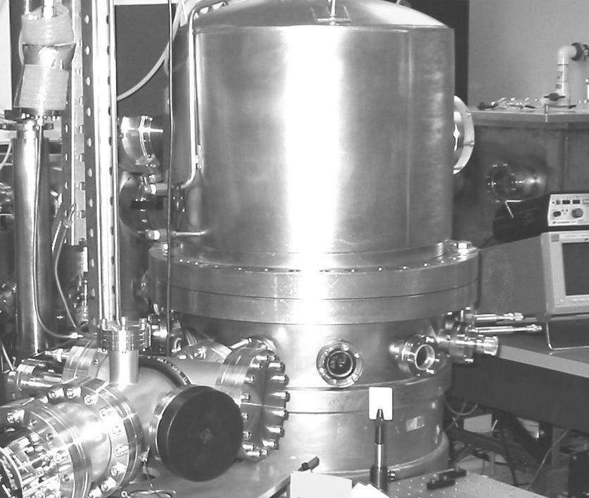 Laser beam EUV detector or Spectrometer Ion collector Thomson parabola Witness plate Vacuum chamber Figure 1: (a)