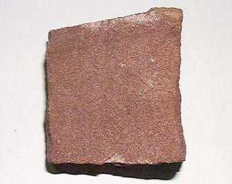 Arkose is a sandstone comprising 25 percent or more feldspar grains, with most of the remaining