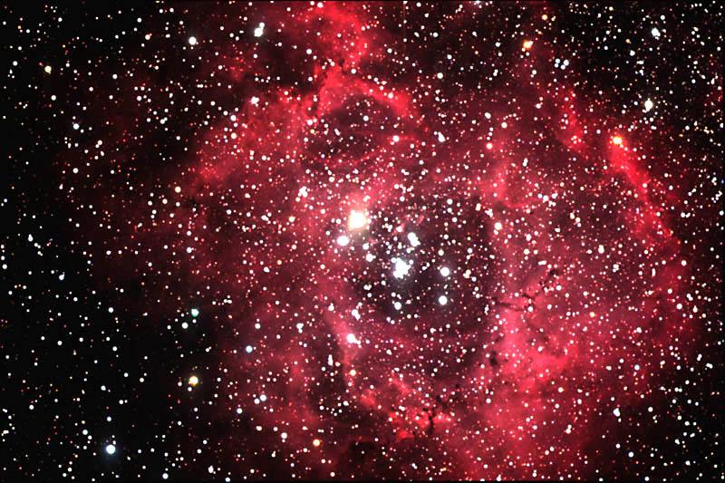 HII Regions: Hot Ionized Hydrogen Example: Rosette Nebula Red glow is from Balmer Hα (3 2) emission Familiar sight in regions of