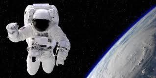 An astonaut in he space suit has a total mass of m 1 = 87 kg, including he oxygen tank. He tethe line loses its attachment to he spacecaft and she is too fa to gab on!