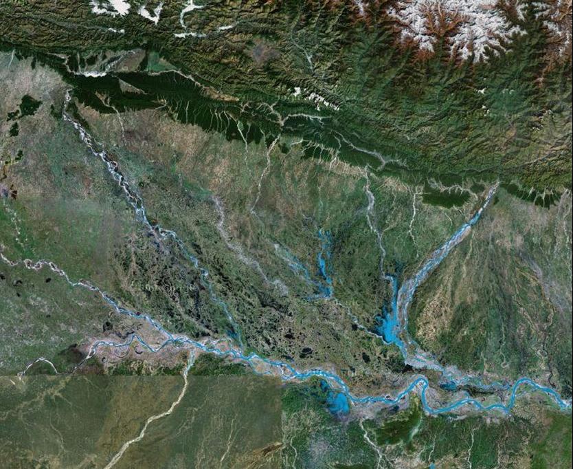Chapter 1: Introduction 1.5 The Kosi and Gandak Rivers Mountain Front Chitwan Dun Outline Mega Fan (approx.) Gandak River Kosi River N 50km Ganga River Figure 1.