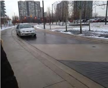 January 25, 2016 File: 165011005 Page 2 of 11 Reference: Square One Drive Extension EA, City of Mississauga - Site Visit to Observe Active Transportation Conditions Figure 1 shows typical sidewalk