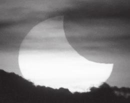 An annular eclipse This image shows two different sizes of the Moon, as seen from Earth one when the Moon is furthest from Earth and one when it