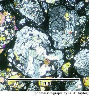 2 of 5 Stony meteorites called chondrites are chock full of chondrules, as shown, above, in the photograph on the left of the Semarkona chondrite.