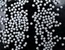 The granules are often coated with several layers, not only with the actual apis but also with coatings resistant to gastric acid or with membranes which allow for a controlled release of the APIs.