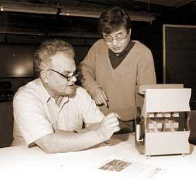 History of Synchrotron Radiation Sources Novosibirsk. Klaus Halbach shown in 1986 with Kwang-Je Kim discussing a model of an undulator that Halbach designed.