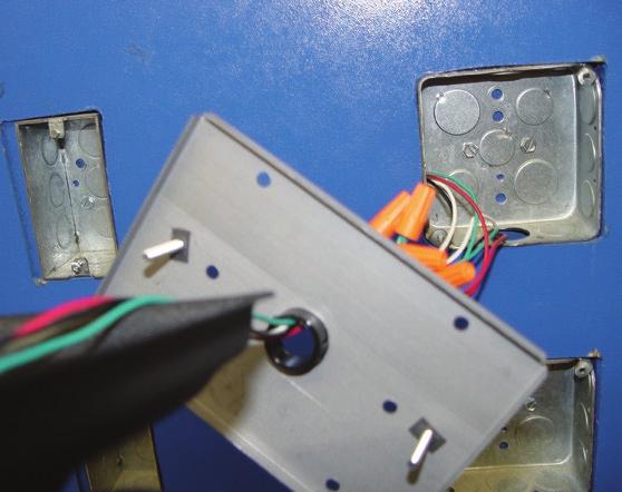Using UL approved wire nuts, make connections between flying leads and wiring inside electrical box. a. Black wire should be connected to hot (run) wire from the master.
