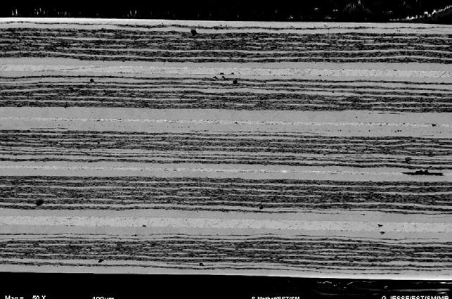 1. 62 mm Figure 4. Micrograph performed on a vacuum soldered stack of 5 tapes It was therefore decided to make the stacks by soldering the tapes together. This work was done at CERN.
