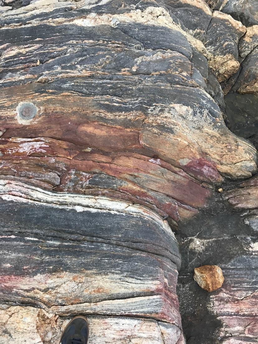This metamorphic rock was originally deposited as volcanically derived sediments in an ancient ocean basin during the Ordovician, approximately 470 million year ago (Hussey, 2010).