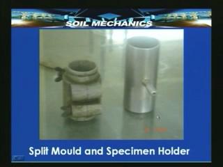 (Refer Slide Time 14:28 min) Here we have the closer view of this split mould and the specimen holder in the triaxial apparatus.