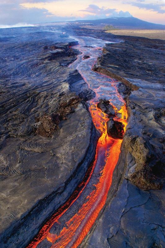 Some geologists have suggested that a 'hot spot' in the mantle, which remains stationary as the Pacific Plate moves over it, explains the existence of the island chain.