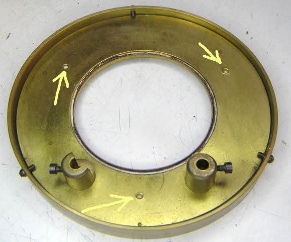 Page 4 Restored Eureka 4793 The first photo shows the rear of the dial pan and the three holes through