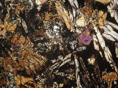 quartz grains are several millimeters or microcrystalline,
