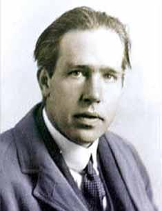 4th Timeframe: Niels Bohr (1885 1962) 11 p+ Bohr stated that electrons revolving around the nucleus are arranged in fixed energy levels or shells (similar to the orbit of planets around the sun).