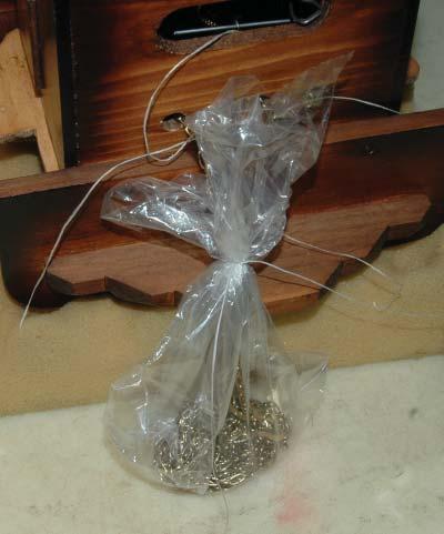 Page - 5 We can solve the dangling chain problem by putting the chains in a plastic bag as shown in this photo.