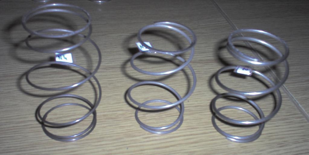 The spring which connects the oscillator and the base is considered in two variants, linear or nonlinear with diﬀerent soft or hard stiﬀness characteristics.