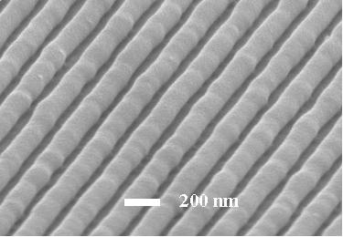 Figure 5 shows the SEM image of the PMMA gratings formed. The replicated gratings were regular and uniform over a large area.
