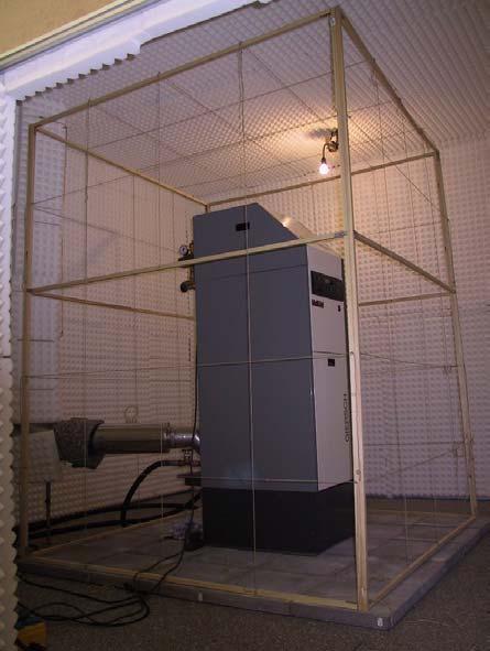 Figure 4: Test room with boiler inside measuring mesh - Setting of the burner (air draught boilers only).