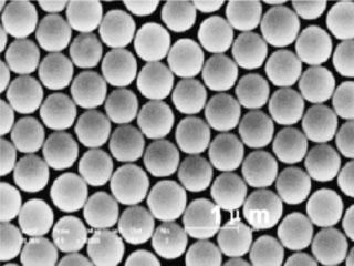 General Synthesis of Two-Dimensional Patterned Conducting... 773 Figure 1. Morphology of the 2D-ordered PS monolayer obtained at the aqueous/air interface. monolayer consisting of PS spheres (av.