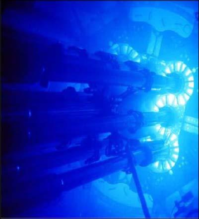 Čerenkov radiation: is radiation emitted when a charged particle) passes through matter at a speed greater