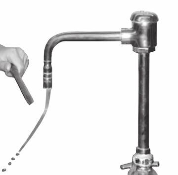 (iii) The student then holds the plastic rod near to a stream of water coming from a tap. The stream of water bends towards the plastic rod.