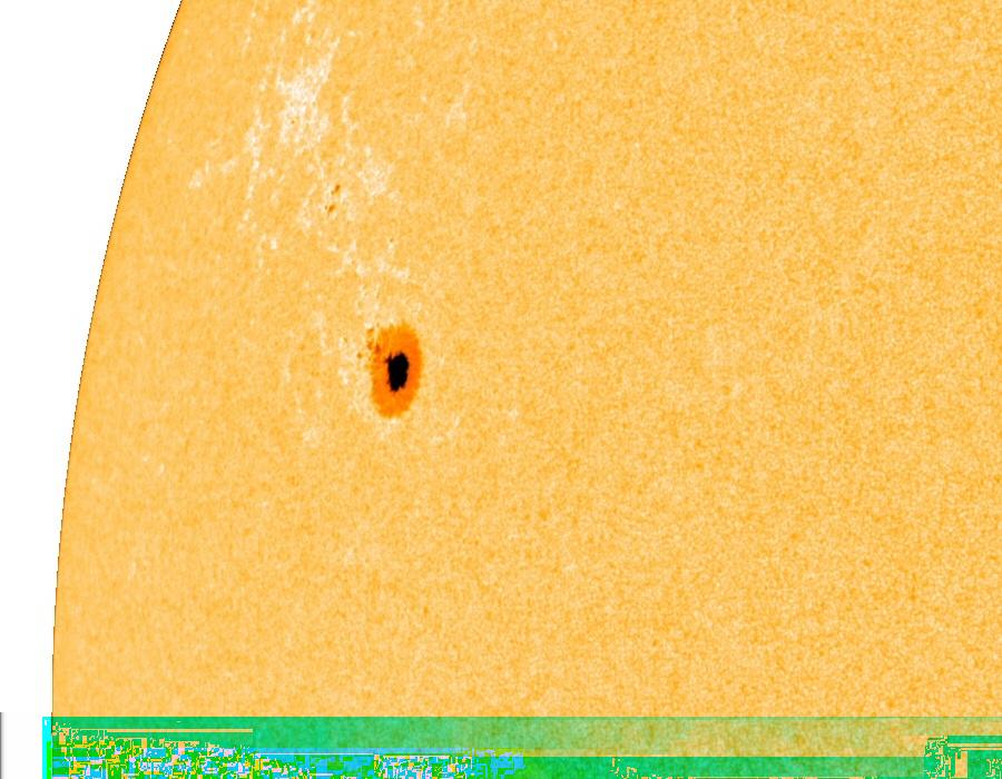 PHYS-1050 Tracking Sunspots Spring 2013 Name: 1 Introduction Sunspots are regions on the solar surface that appear dark because they are cooler than the surrounding photosphere, typically by about