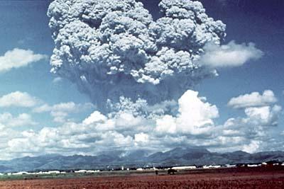 Volcanoes spew enormous amounts of material into the atmosphere, including sulfur dioxide,