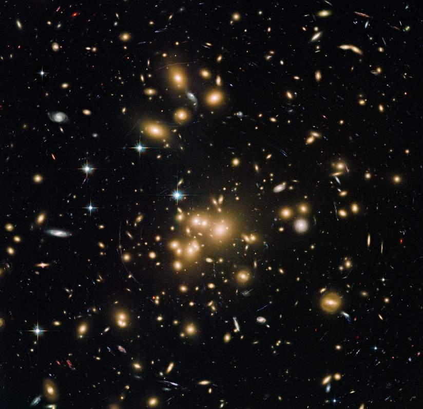 Galaxy clusters lensing arcs Abell 1689 most massive gravitational bound objects in the Universe contain up to