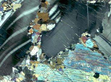 (e and f) Recrystallized orthopyroxene and