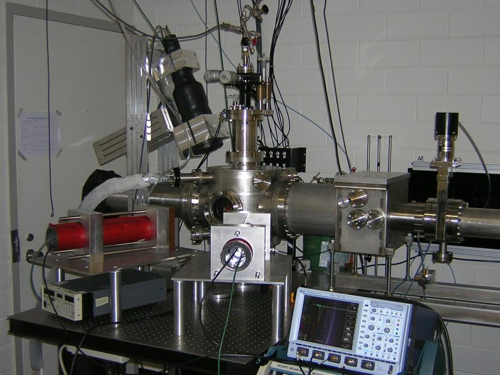 single particles. Neutron emission is observed by four scintillating neutron detectors. They are composed of a cylindrical plastic scintillator with a diameter of 12.7 cm and 15.