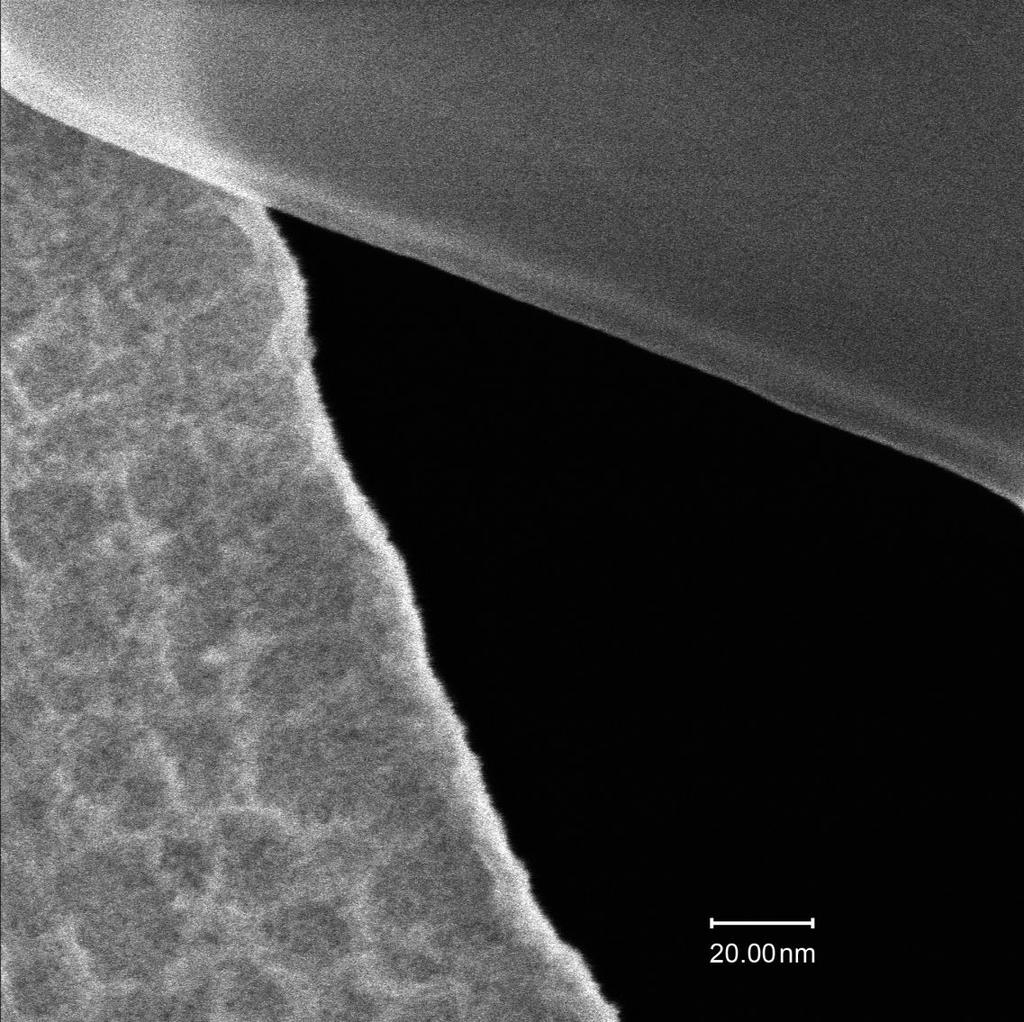 Zeiss Orion: He Ion Microscope For demonstration of the image resolution of 0.24 Nanometers a linescan over the very sharp edge of an asbestos fiber on a thin holey carbon foil is shown.