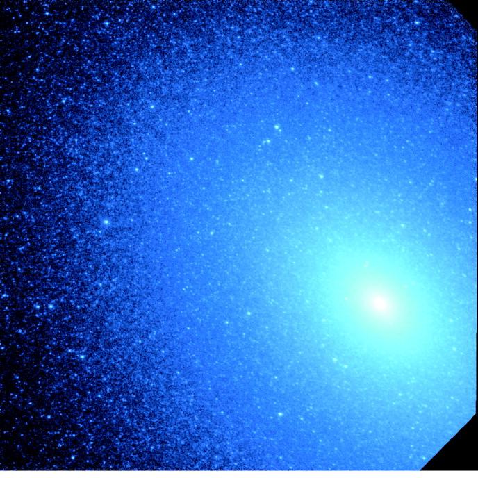 The E3 galaxy M32 - Small, inactive companion of the Andromeda nebula This false-color UV image of the M32 center uses a logarithmic scaling to enhance the faintest stars.