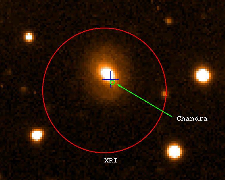 Figure 2 VLT optical image 17 showing the association of GRB 050724 with the galaxy. The blue cross is the position of the optical transient 16,17.