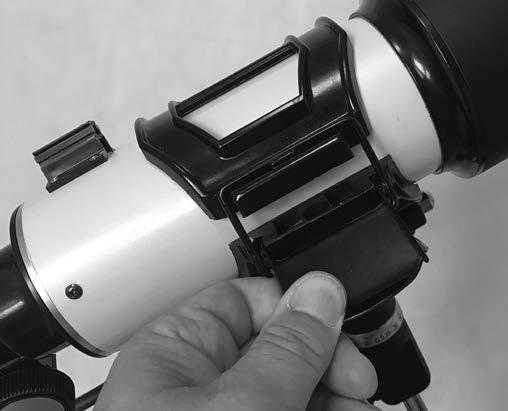 To do so, without moving the telescope, use the finder scope s vertical and horizontal adjustment knobs (shown in Figure 13) to position the red dot on the object. 5.