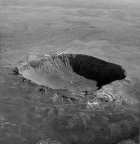 Image 9 What is this ellipse? How would you describe this region? How might the teardropshaped landforms have formed?