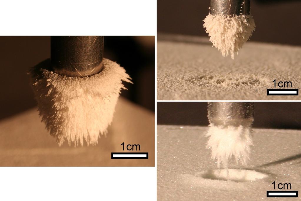 Adhesion Materials adhere to a grounded rod