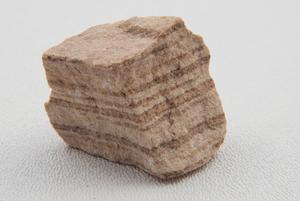 Sedimentary Rocks : Rocks roll down, hit each other and crack and they are broken down into small fragments.