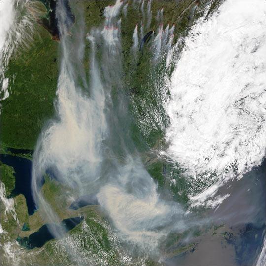 Figure 3. Satellite image of aerosol plumes produced by wildfires in Canada on July 7, 2002. The Great Lakes are in the bottom left part of the figure.