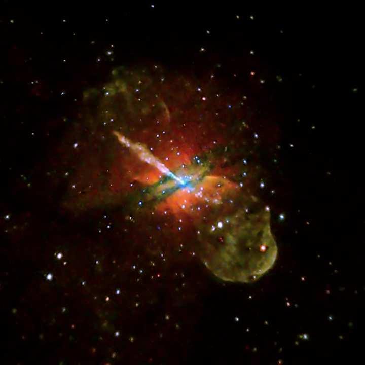 Figure 1. Image of galaxy Centaurus A showing the presence of a black hole and its jets at the center (Observed by X-ray space observatory Chandra). In the image: red indicates low-energy X-rays.