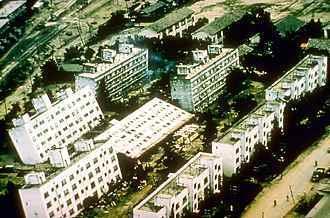 An aerial view of apartment houses in Niigata, Japan shows the devastation caused by a