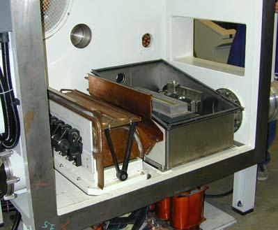 Figure 1. Web path inside the laboratory web-coater. The ceramic boats evaporation unit equipped with the metal wire-feeding system is placed under the first process drum.